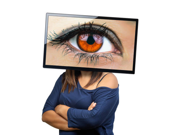 big female eye on tv screen looking isolated. Big Brother is watching you. Conceptual image. big female eye on tv screen looking isolated. Big Brother is watching you. Conceptual image. woman spying through a keyhole stock pictures, royalty-free photos & images