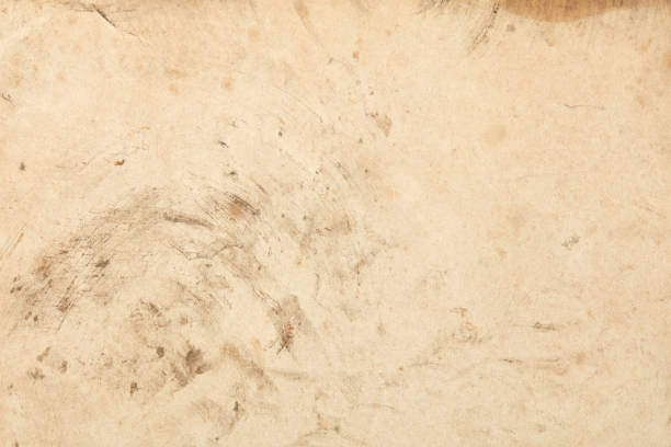 istock Old paper with black stains and signs texture background 1314542602