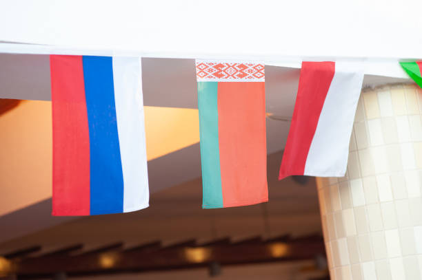 istock Russian, Belarusian and Polish flags 1314546382