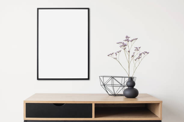 istock Blank picture frame on a wall. Artwork mock-up in interior design 1314546606
