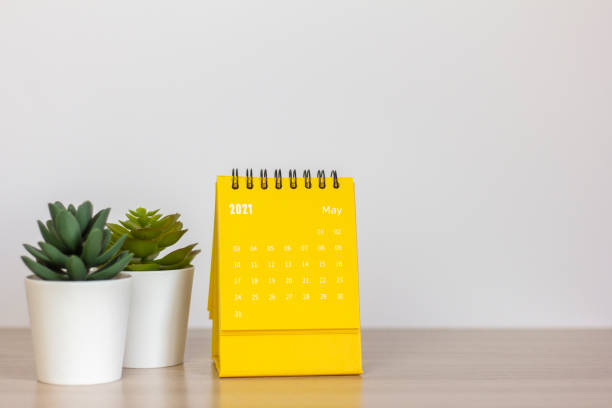 istock Desktop calendar for May 2021. Calendar for planning, assigning, organizing, and managing each date. 1314547473