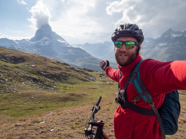 istock Mountain biker taking selfie on bicycle trail 1314549211