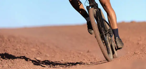 Photo of Mountain biker riding on bike singletrack trail