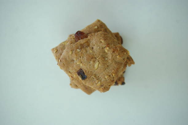 istock Handmade whole grain biscuits with cinnamon and raisins 1314549803