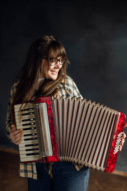 istock A woman plays the accordion 1314549819