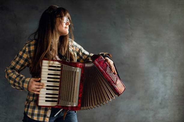 istock A woman plays the accordion 1314549834
