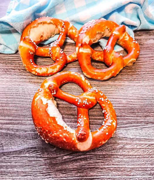 istock Three delicious bavarian pretzels at table 1314552254