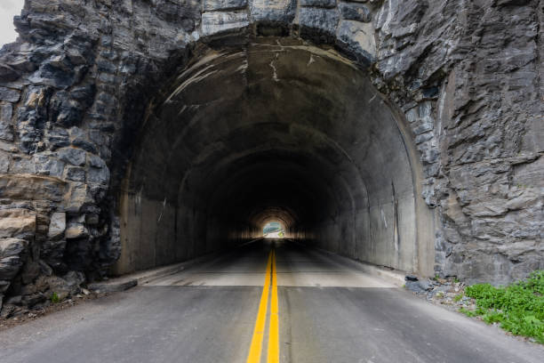 istock Long Tunnel Toward Mountain Pass 1314554551