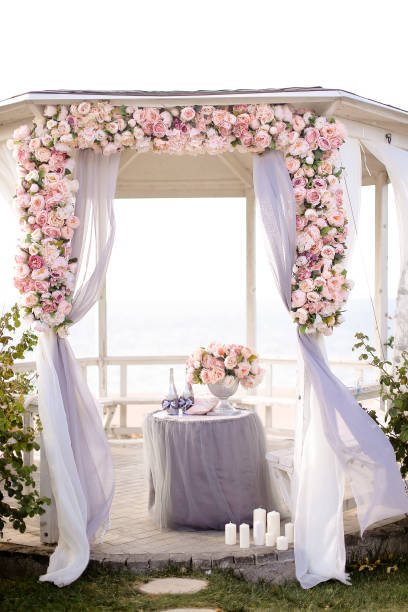 istock Close up wedding arch decorated by roses 1314556548