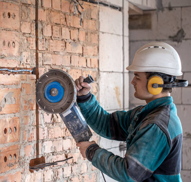 istock A handyman at a construction site works as a grinder. 1314561482