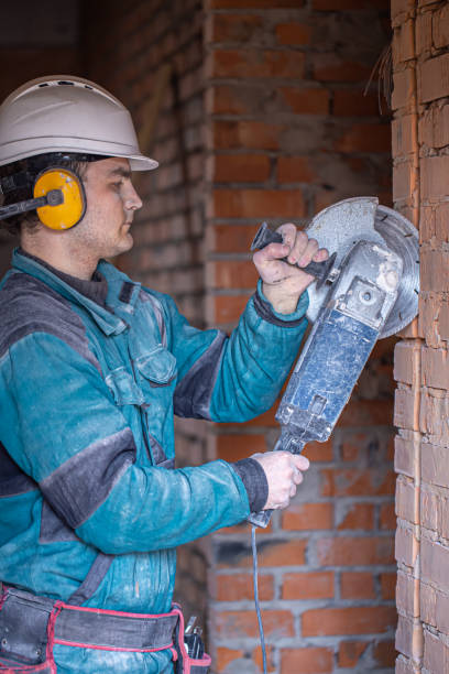 istock Handyman at a construction site in the process of cutting with a grinder. 1314561589