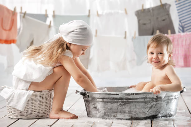 istock Bathing baby in the laundry room 1314561998