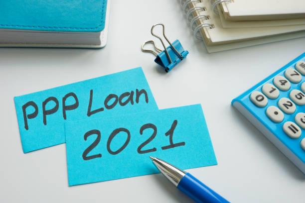 istock PPP loan 2021 words on the blue memo sticks. 1314568969