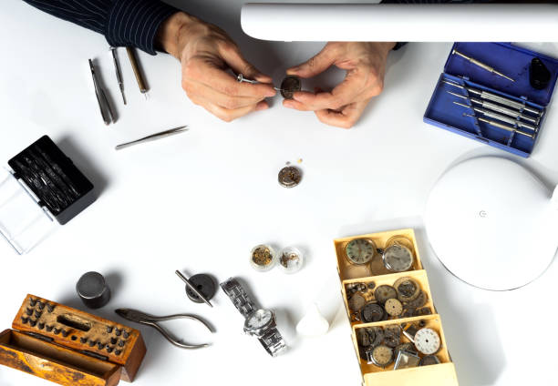 istock The hands of a watchmaker 1314569462