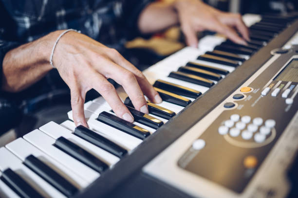 istock Close up of pianist's hands on the keyboard 1314570718