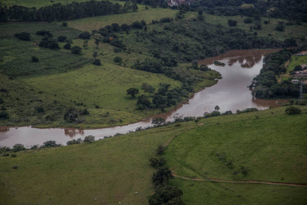 istock Farm  and river aerial view 1314572027