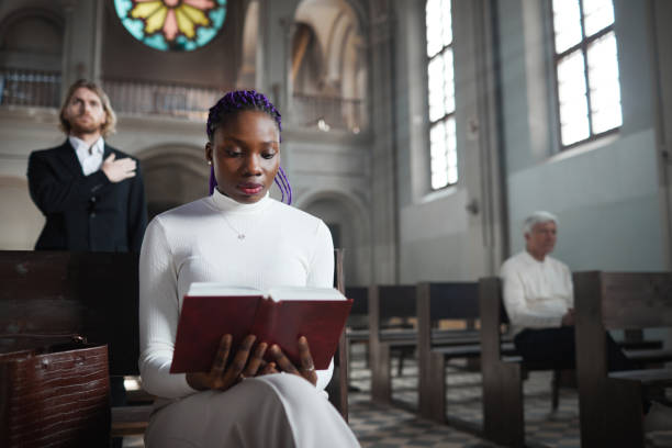 istock Woman reading the Bible 1314575408