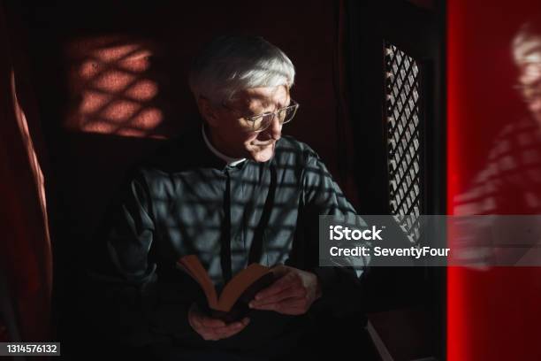 Priest In The Confessional Stock Photo - Download Image Now - Confession Booth, Confession - Religion, Priest