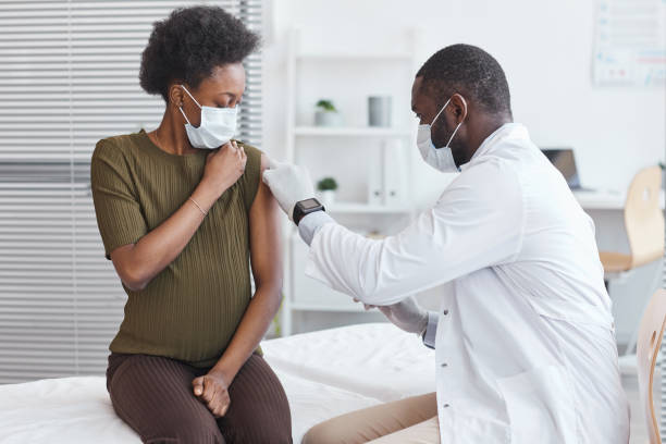 Doctor vaccinating he patient
