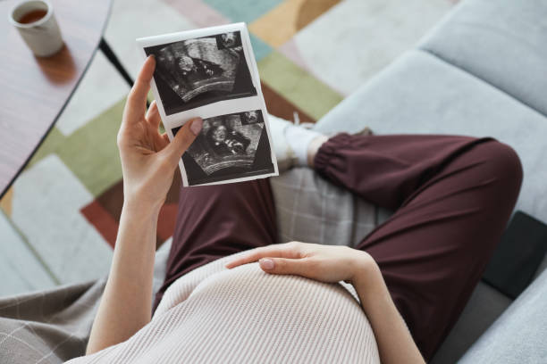 istock Pregnant woman with x-ray image 1314577246