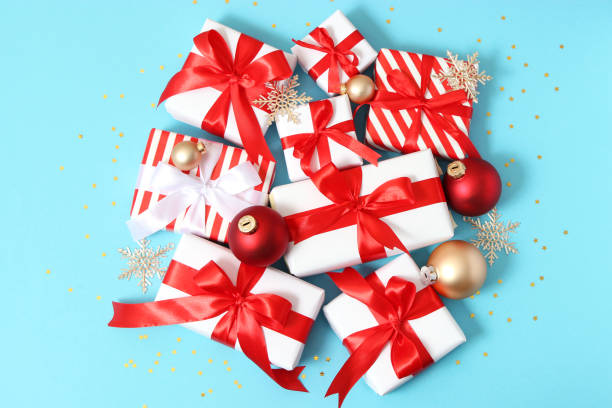 istock Set of beautifully wrapped gift boxes and Christmas decor 1314578298
