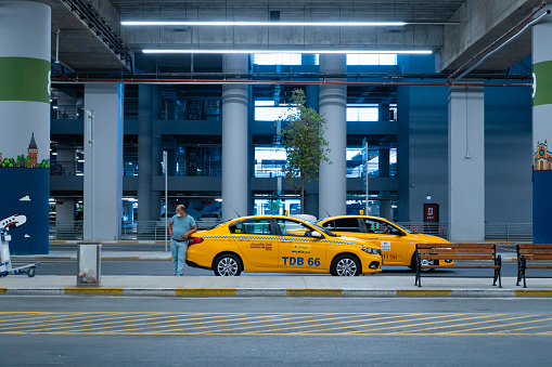 Typical yellow taxi car on the street in Istanbul. Turkey , Istanbul - 07.19.2020