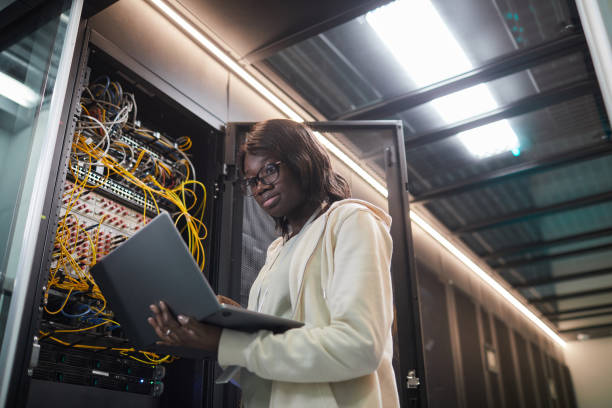 istock African American Woman Inspecting Servers in Data Center 1314579946