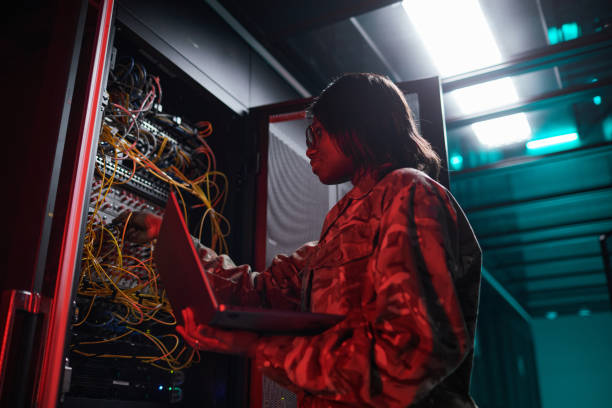 istock African American Woman Inspecting Sever Network 1314579991