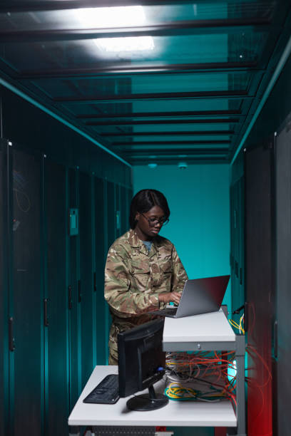 istock African American Woman Managing Servers in Data Center 1314580035