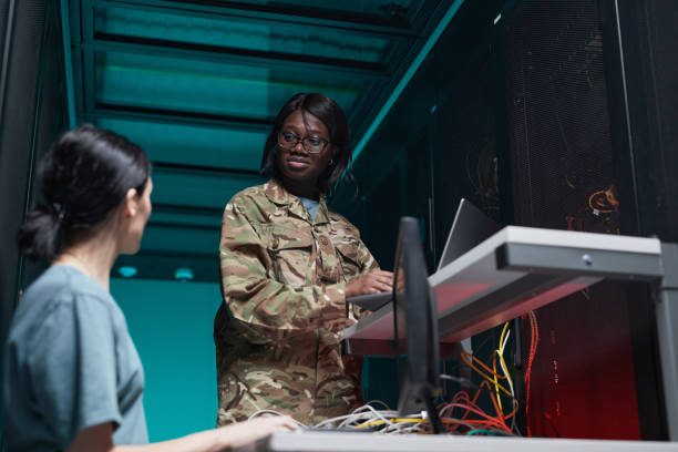 istock Women Managing Servers in Data Center 1314580076