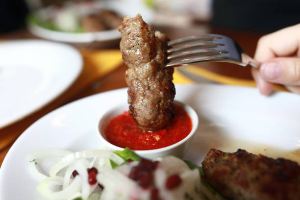 Raw steak on fork isolated.My other similar images