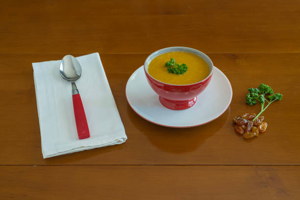 paris, france: vegetable soup with raisins and parsley served in a bowl - sweet sauce tablespoon food sweet food imagens e fotografias de stock