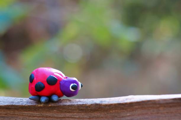 istock Figurine of a ladybug made of plasticine. 1314585317