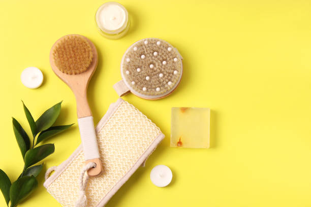 istock brush for dry massage on a colored background top view. 1314586037