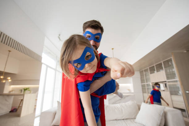 istock Father and son play superhero 1314589188