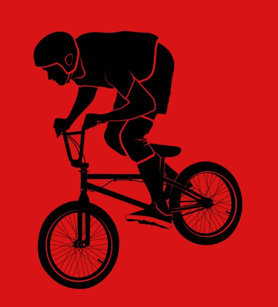 BMX cyclist BMX cyclist silhouette on red background bmx racing stock illustrations