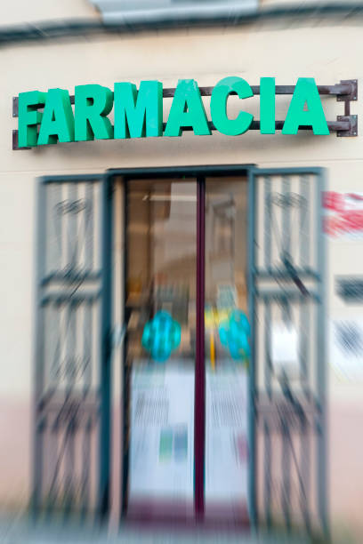 istock Pharmacy sign and defocused store facade. 1314598906
