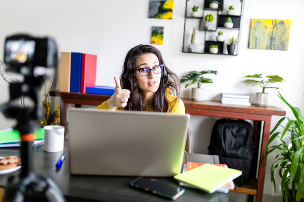 istock Teacher woman teaching remotely from home 1314600356