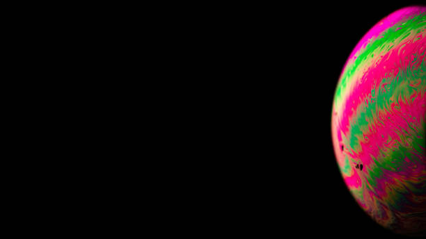 istock Abstract background planet. Globe planet earth in galaxy universe space with sun on black background. Abstract colorful soap bubble. 1314600640