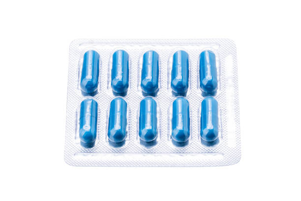 istock blue pill pack isolated on white background. drug blister cut out 1314606147