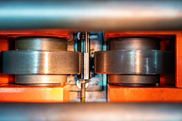 top view image close up steel bar or rod material workpiece and roller of continuous horizontal cnc automatic thread rolling machine for industrial