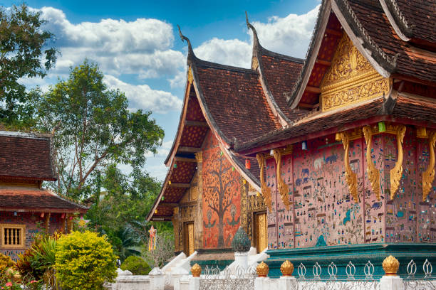 Wat Xieng Thong Temple in Luang Prabang, Laos Detail of the Wat Xieng Thong Temple in Luang Prabang, Laos. This Buddhist temple ("Wat") was built in 1560 by King Setthathirath close to the Mekong River at the peninsula of Luang Prabang, the former capital of the Kingdom of Laos. monastery religion spirituality river stock pictures, royalty-free photos & images