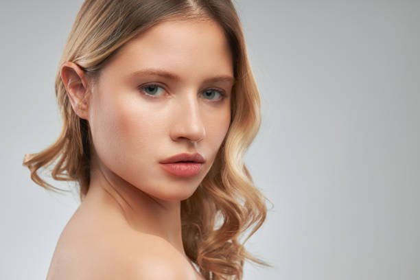istock Pretty lady with clear skin posing with no makeup. 1314615931