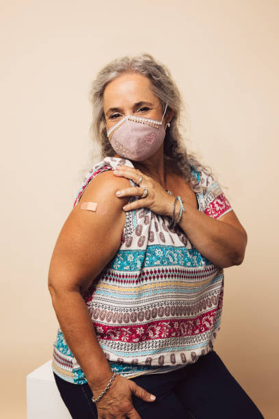 istock Senior woman getting a covid vaccine 1314619696