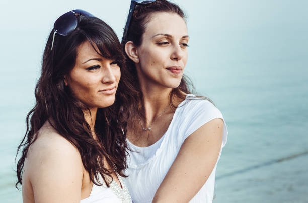 istock lesbian friends on the beach 1314625832