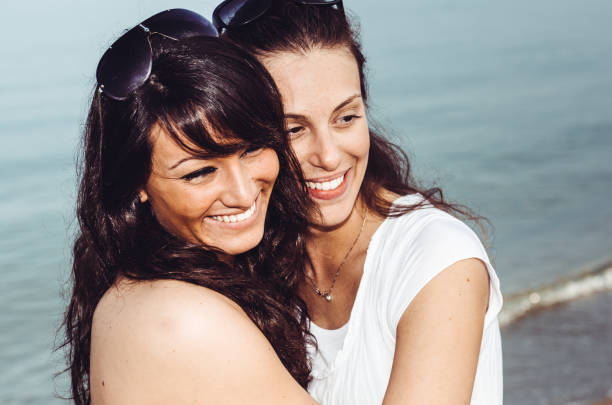 istock lesbian friends on the beach 1314626083