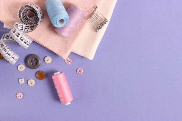istock sewing accessories close-up. hobbies, fabrics and threads for sewing 1314626366