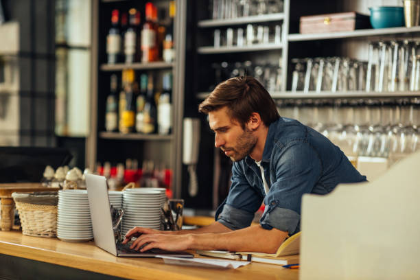istock Small business owner online banking 1314630295