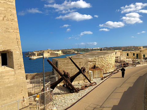Old anchor exhibited at the edge of a street at the historic fort Elmo at the sea promenade in Valletta in Malta March 5,2020