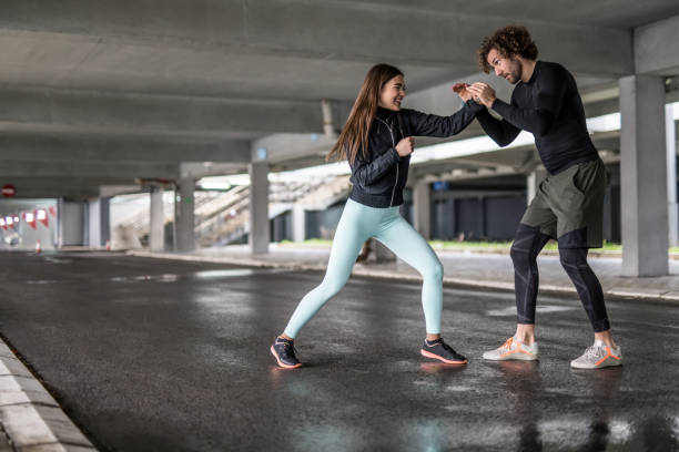 istock Young athletic couple practicing boxing skills. 1314638191